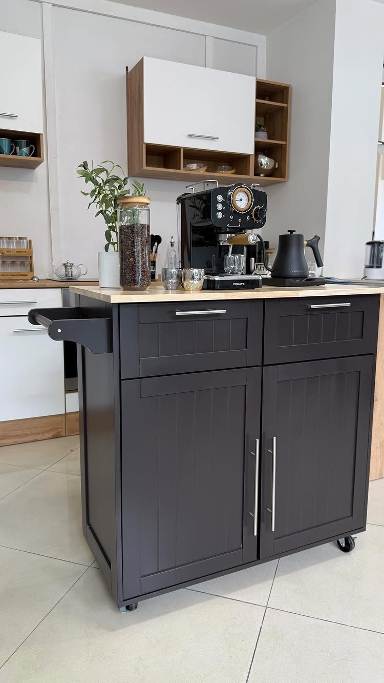 A dark grey mobile coffee bar cart with an espresso machine and grinder on a wooden top.