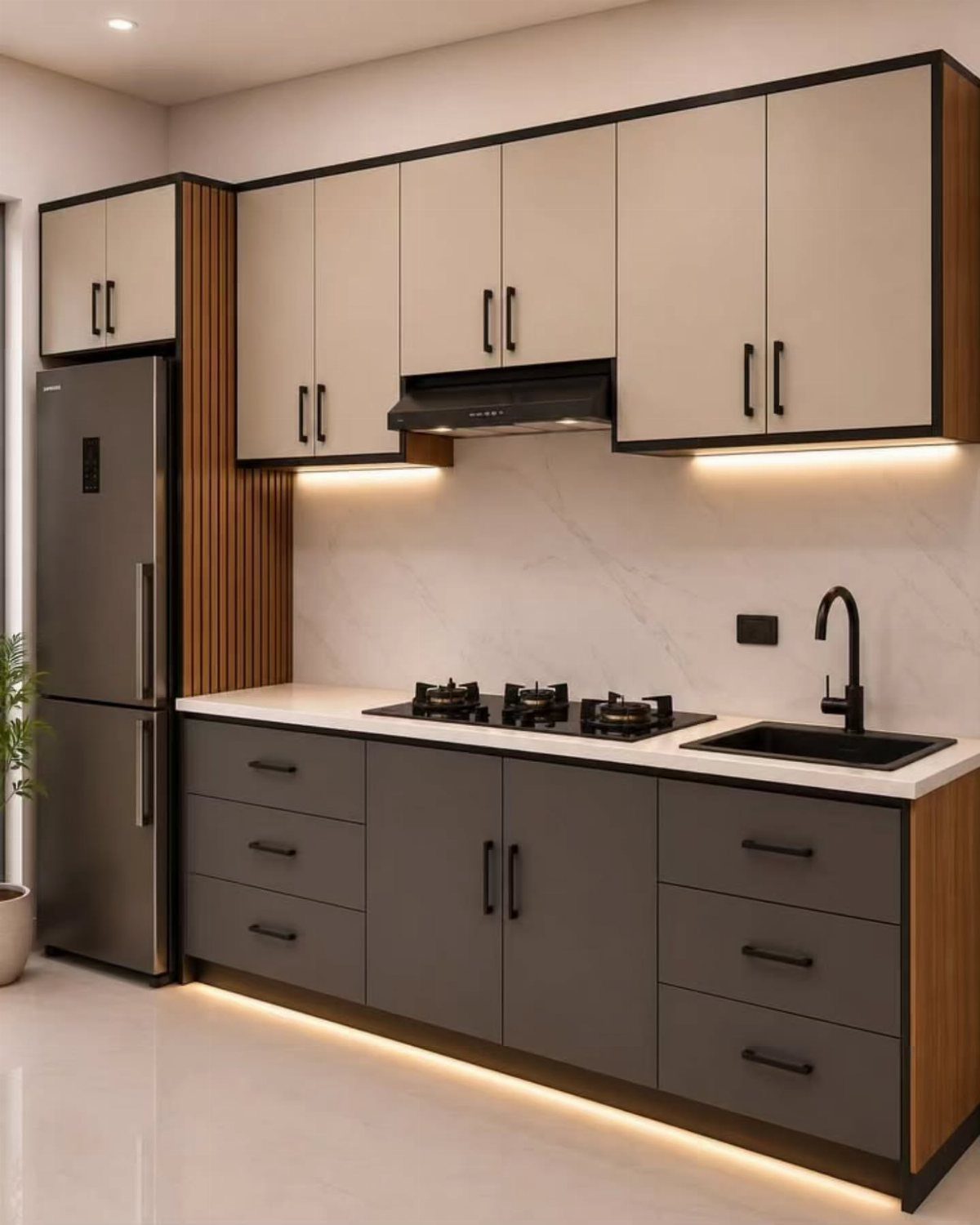 Modern kitchen with cream upper cabinets and dark grey lower cabinets with under-cabinet lighting.