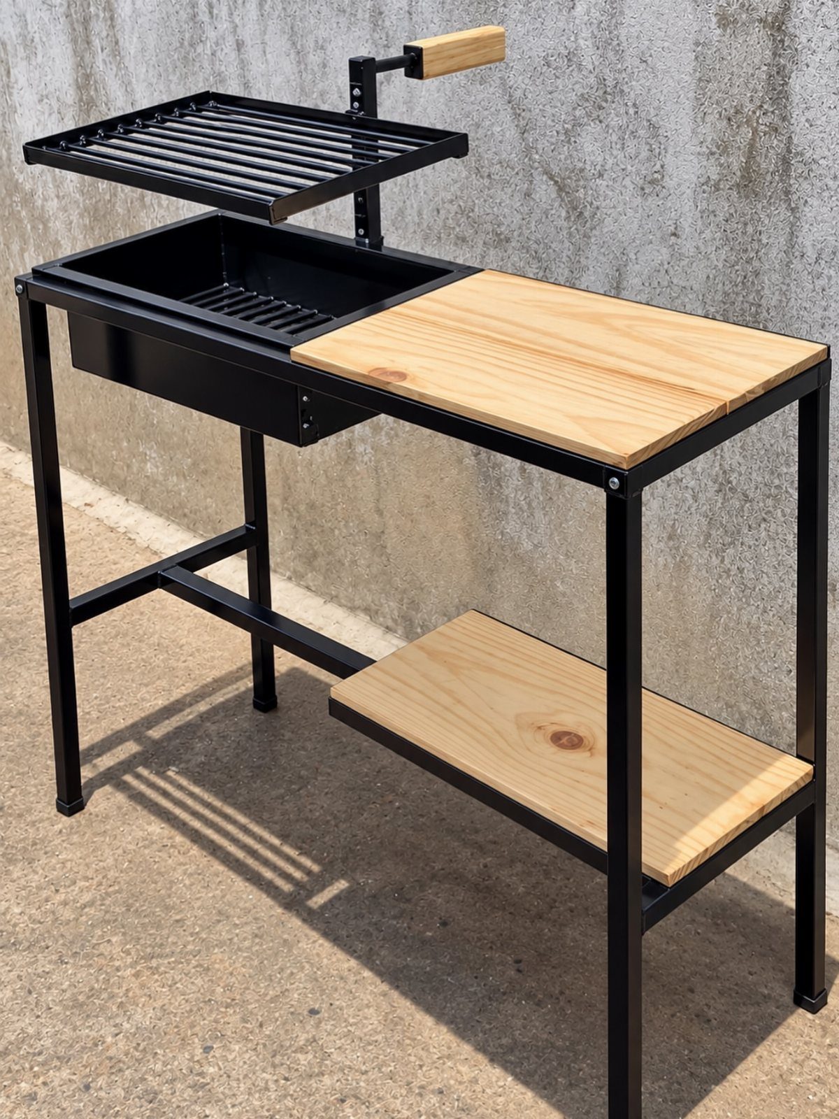 A black metal freestanding grill station with light wood countertops and a lower shelf.